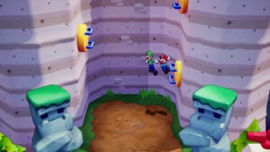 Mario & Luigi use climbing gizmos to wall jump up a cliff