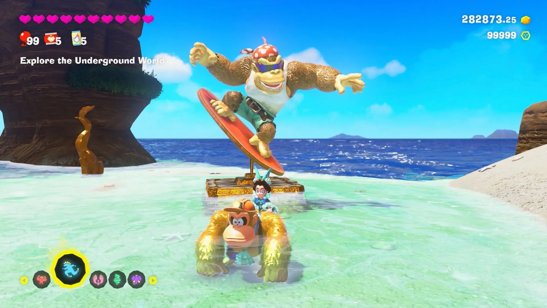 DK & Pauline stand in front of a Funky Kong statue on DK Island in Donkey Kong Bananza